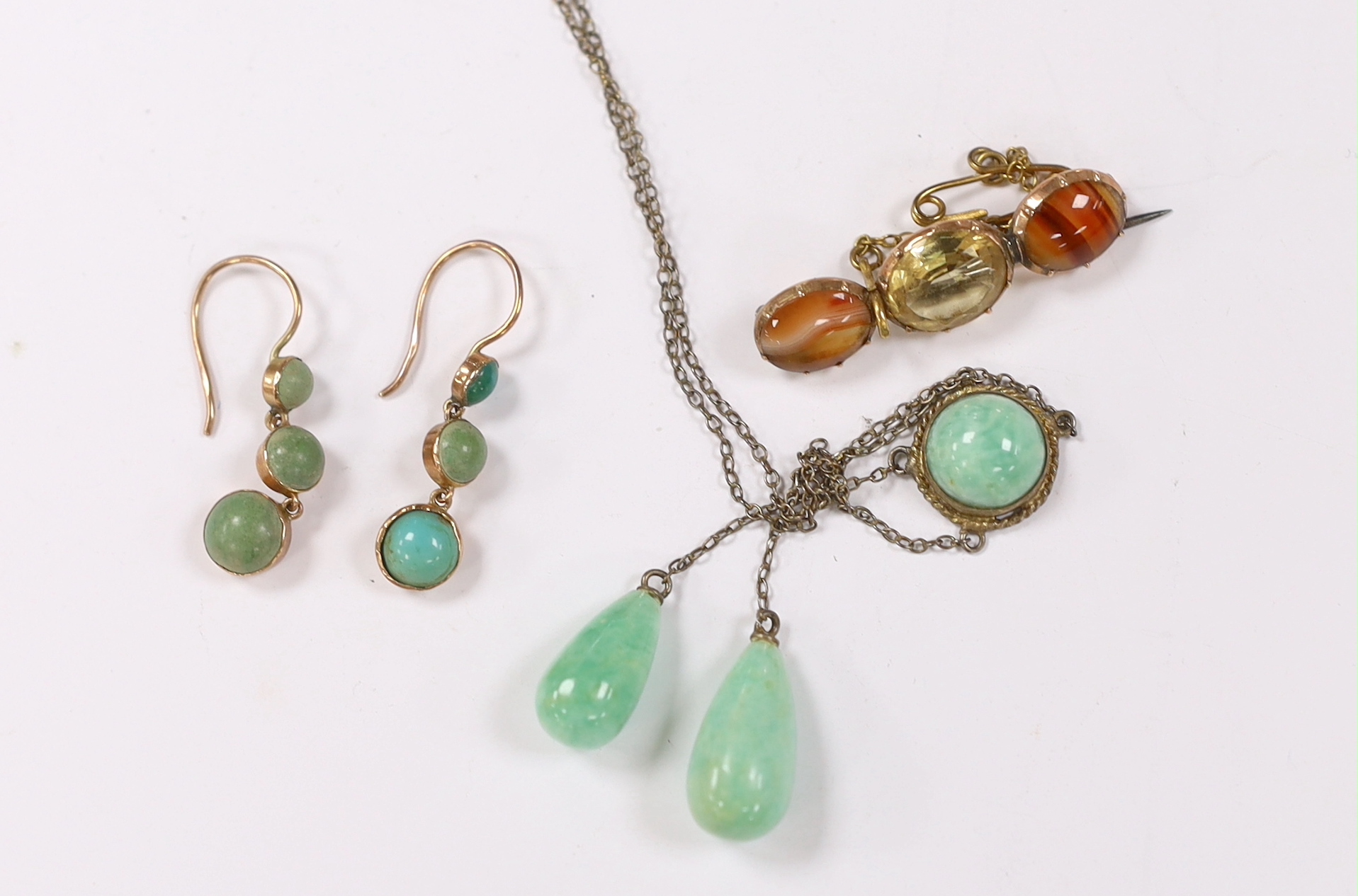 A small yellow metal enamel and five stone diamond set brooch, 17mm, a banded agate and citrine set brooch, a pair of turquoise set drop earrings and a necklace.